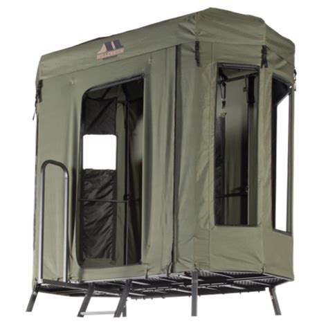 seats (not included) Multi-configuration windows for rifle, crossbow or vertical bow hunting. . Millennium buck hut cover q20100